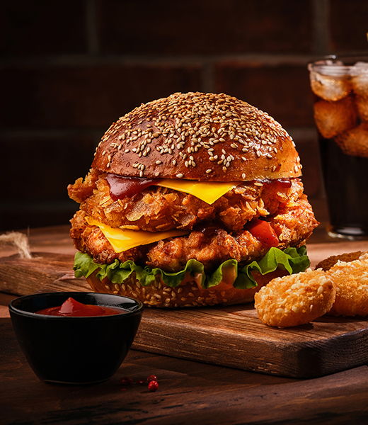 Fresh tasty homemade burger on wooden table. Big double cheddar